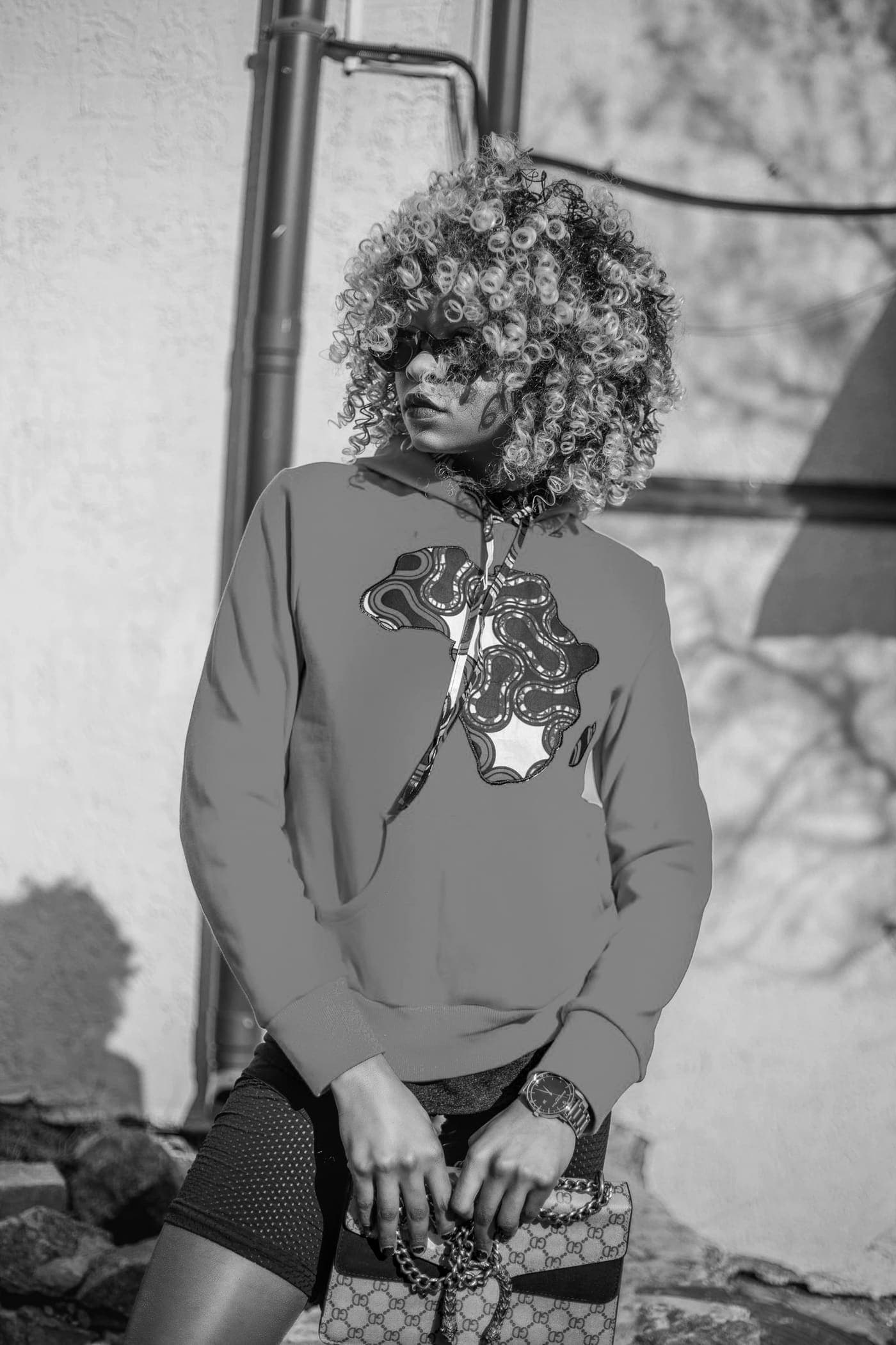 Look 03 — Hair out, hood down